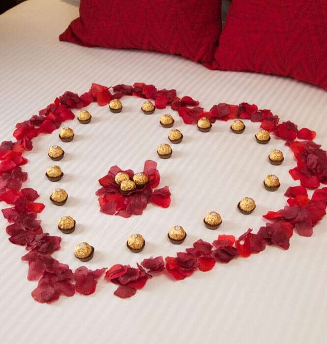 rose petal and chocolate heart bed display shot